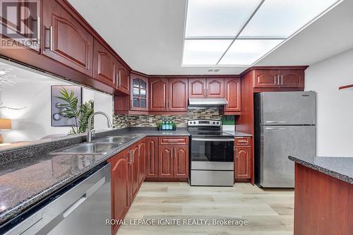 215 - 88 Alton Towers Circle, Toronto, ON - Indoor Photo Showing Kitchen With Double Sink
