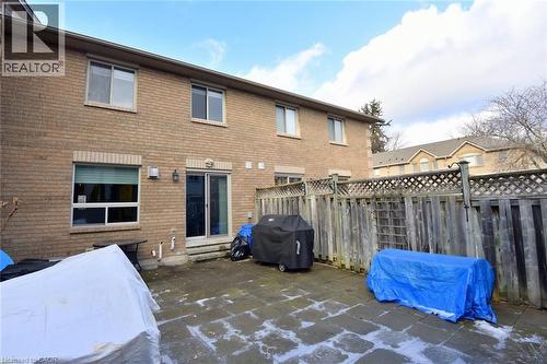 Back of property with brick siding and entry steps - 1245 Stephenson Drive Unit# 20, Burlington, ON 