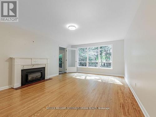 15 York Valley Crescent, Toronto, ON - Indoor Photo Showing Living Room With Fireplace