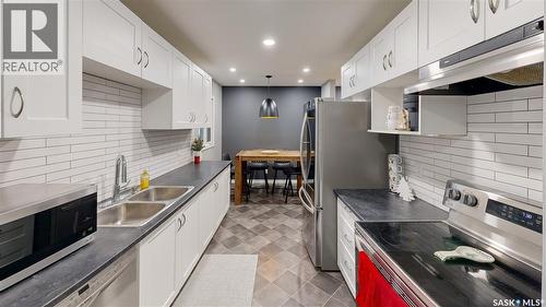 1714 7Th Avenue E, Regina, SK - Indoor Photo Showing Kitchen With Double Sink