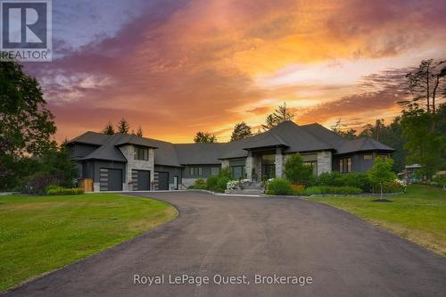 8 Midves Court, Springwater (Midhurst), ON - Outdoor With Facade