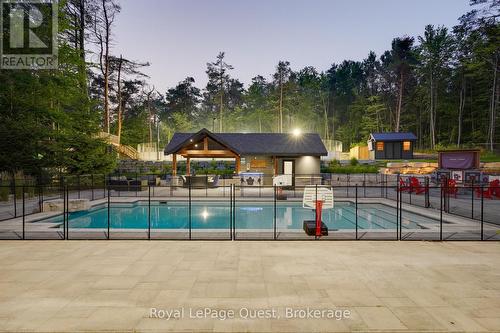 8 Midves Court, Springwater (Midhurst), ON - Outdoor With In Ground Pool