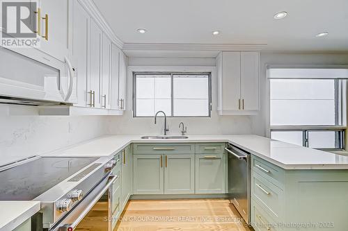 47 Waterloo Avenue, Toronto, ON - Indoor Photo Showing Kitchen With Double Sink