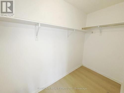 Primary Bedroom - Walk-ion Closet #2 - 64 Honeyview Trail, Brampton, ON - Indoor With Storage