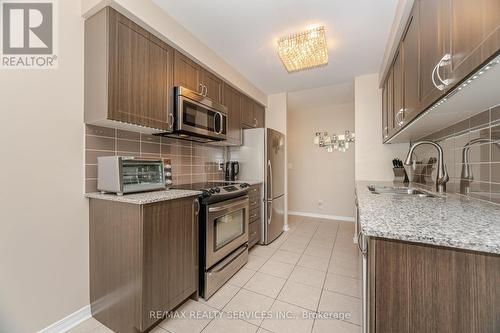 105 - 60 Via Rosedale Way, Brampton, ON - Indoor Photo Showing Kitchen With Stainless Steel Kitchen