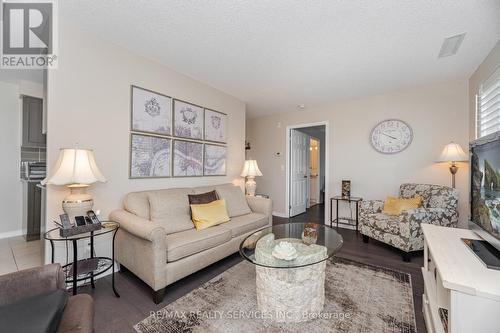 105 - 60 Via Rosedale Way, Brampton, ON - Indoor Photo Showing Living Room