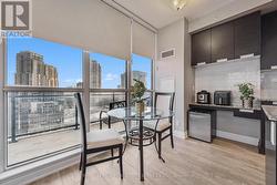 Dining Area with Walkout to the Private Balcony - 