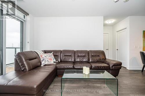718 - 2550 Simcoe Street N, Oshawa, ON - Indoor Photo Showing Living Room