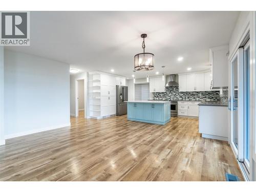 living room / dining room to kitchen - 401 97A Highway, Sicamous, BC - Indoor Photo Showing Kitchen With Upgraded Kitchen