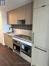 318 - 1200 Dundas Street W, Toronto, ON  - Indoor Photo Showing Kitchen 