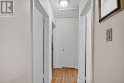 Main floor hallway with linen closet. - 