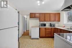 Portable dishwasher is in the fridge location. - 