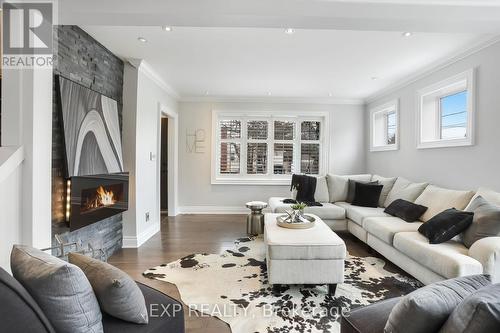 231 #8 Highway, Hamilton, ON - Indoor Photo Showing Living Room With Fireplace
