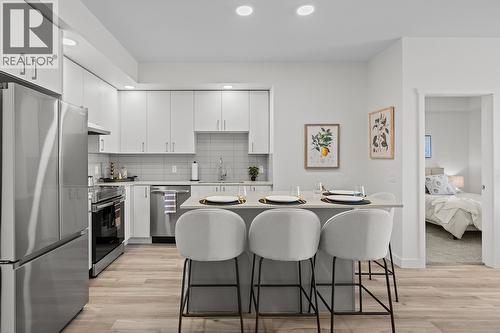 Photos are of a similar home; some features may vary - 1111 Frost Road Unit# 310, Kelowna, BC - Indoor Photo Showing Kitchen With Stainless Steel Kitchen