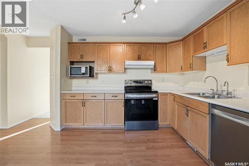 5169 Donnelly Crescent, Regina, SK - Indoor Photo Showing Kitchen With Double Sink