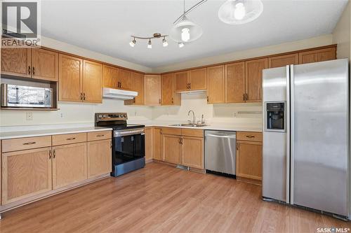 5169 Donnelly Crescent, Regina, SK - Indoor Photo Showing Kitchen With Stainless Steel Kitchen With Double Sink