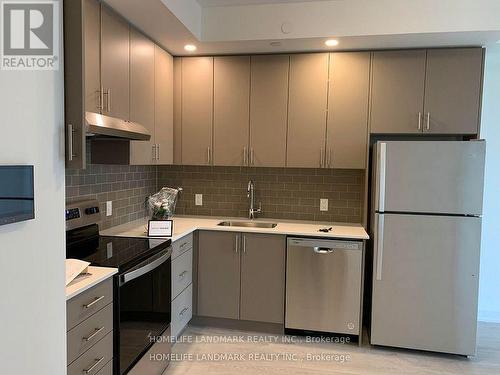 # 1214 - 3220 William Coltson Avenue E, Oakville, ON - Indoor Photo Showing Kitchen With Stainless Steel Kitchen
