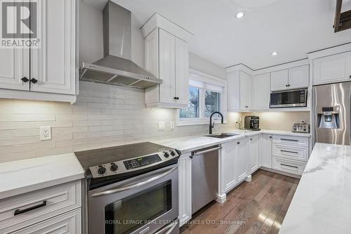 Features Quartz Countertops and S/S Appliances - 1302 Hillview Crescent, Oakville, ON - Indoor Photo Showing Kitchen With Upgraded Kitchen