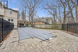 Heated Inground Pool with a Waterfall Feature - 