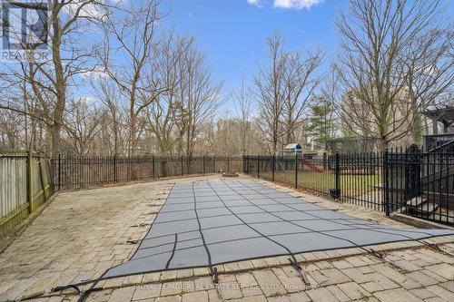 Heated Inground Pool with a Waterfall Feature - 1302 Hillview Crescent, Oakville, ON - Outdoor
