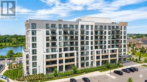 709 - 720 Whitlock Avenue, Milton, ON - Outdoor With Balcony With Facade