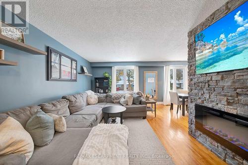 31 Raleigh Street, Hamilton, ON - Indoor Photo Showing Living Room With Fireplace