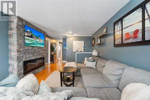 31 Raleigh Street, Hamilton, ON - Indoor Photo Showing Living Room With Fireplace