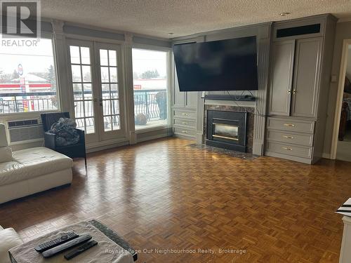 282 King Street W, Oshawa, ON - Indoor Photo Showing Living Room With Fireplace