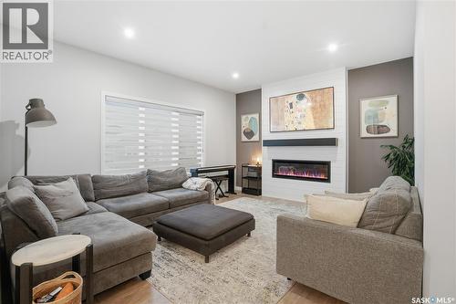 746 Bentley Manor, Saskatoon, SK - Indoor Photo Showing Living Room With Fireplace