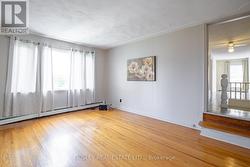 Upstairs living rm/family rm. - 