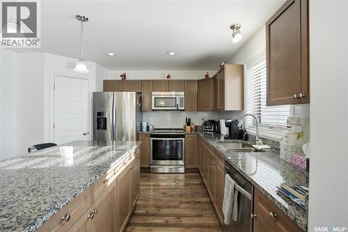 347 Palliser Way, Saskatoon, SK - Indoor Photo Showing Kitchen With Double Sink With Upgraded Kitchen