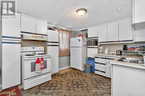 332 Wardell Street, Tay (Port Mcnicoll), ON - Indoor Photo Showing Kitchen With Double Sink