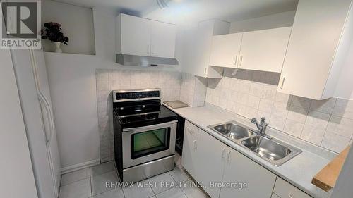 Basement - 1559 Northmount Avenue, Mississauga, ON - Indoor Photo Showing Kitchen With Double Sink