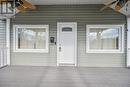 Spacious covered front porch with ceiling fans - 3794 Mathewson Avenue, Fort Erie (Crystal Beach), ON  - Outdoor With Exterior 