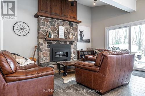250 Orchard Avenue, Zorra, ON - Indoor Photo Showing Living Room With Fireplace