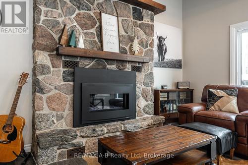 250 Orchard Avenue, Zorra, ON - Indoor Photo Showing Living Room With Fireplace