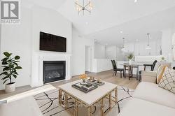 Open Concept Living Area with Gas Fireplace - 