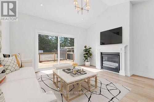 Vaulted Ceilings in Living Room - 161 Pomeroy Avenue, Tweed (Tweed (Village)), ON - Indoor Photo Showing Living Room With Fireplace