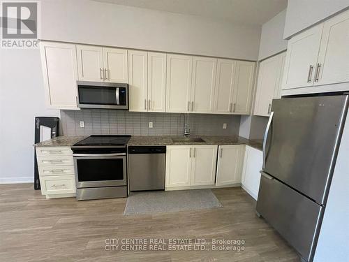 609 - 4085 Parkside Village Drive, Mississauga, ON - Indoor Photo Showing Kitchen With Stainless Steel Kitchen