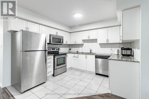 22 - 2488 Post Road, Oakville (Ro River Oaks), ON - Indoor Photo Showing Kitchen With Stainless Steel Kitchen