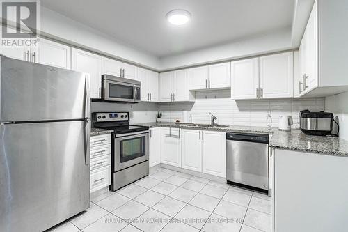22 - 2488 Post Road, Oakville (Ro River Oaks), ON - Indoor Photo Showing Kitchen With Stainless Steel Kitchen