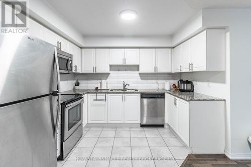 22 - 2488 Post Road, Oakville (Ro River Oaks), ON - Indoor Photo Showing Kitchen With Stainless Steel Kitchen With Upgraded Kitchen