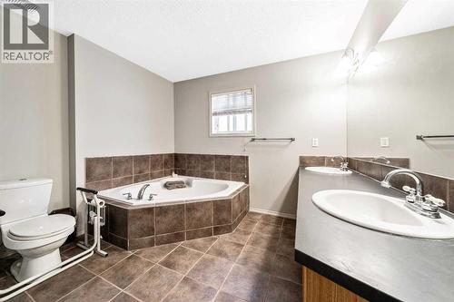 40 Mckinnon Street Nw, Langdon, AB - Indoor Photo Showing Bathroom