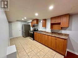 Kitchen with New Stainless Steel Appliances - 