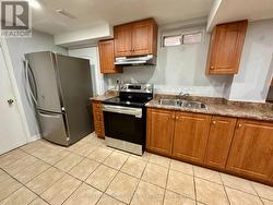 Kitchen with New Stainless Steel Appliances - 