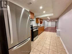 Kitchen with New Stainless Steel Appliances - 