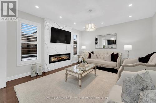 31 Prady Lane, New Tecumseth, ON - Indoor Photo Showing Living Room With Fireplace