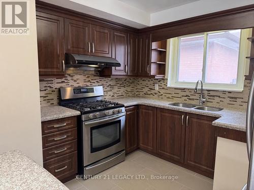 15 Vange Crescent, Toronto, ON - Indoor Photo Showing Kitchen With Double Sink