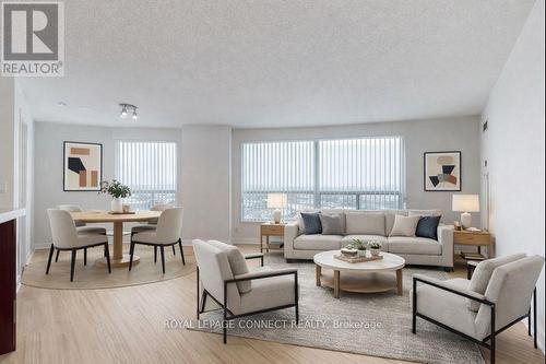 Virtually enhanced - 3111 - 36 Lee Centre Drive, Toronto, ON - Indoor Photo Showing Living Room