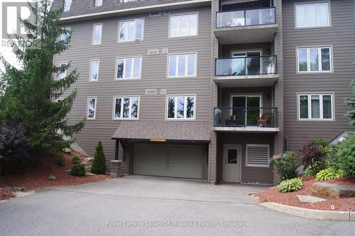 1 - 24 Dairy Lane, Huntsville (Chaffey), ON - Outdoor With Balcony With Facade